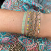 HANDMADE SINGLE GREEN ONYX STONE BRACELET IN GOLD AND YELLOW TONES