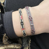 HANDMADE BEADED BRACELET IN BLACK, PINK AND SILVER TONES