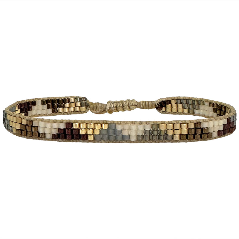 This cool bracelet is handwoven by our team of artisans in Colombia using Japanese glass beads.   Wear it with your favourite accessories !  Details:      Women Bracelet     Japanese glass beads     Handwoven adjustable bracelet     Width 5mm     Can be worn in the  water