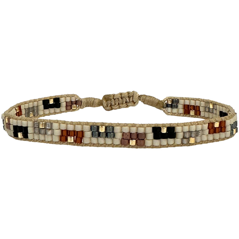This cool bracelet is handwoven by our team of artisans in Colombia using Japanese glass beads.   Wear it with your favourite accessories !  Details:      Women Bracelet     Japanese glass beads     Handwoven adjustable bracelet     Width 5mm     Can be worn in the  water