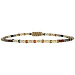 Handwoven in Colombia, this feminine bracelet features a single row of Japanese glass beads in silver and pink tones.  Wear this stylish bracelet alone or as a part of a bracelet layering combination, with your favourite jeans & t-shirt!  Details:  - Japanese glass beads  - Width: 2mm  - Adjustable bracelet 