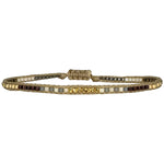 Handwoven in Colombia, this feminine bracelet features a single row of Japanese glass beads in gold and brown tones and gold faceted beads  Wear this stylish bracelet alone or as a part of a bracelet layering combination, with your favourite jeans & t-shirt!  Details:  -Gold faceted beads  - Japanese glass beads  - Width: 2mm  - Adjustable bracelet 