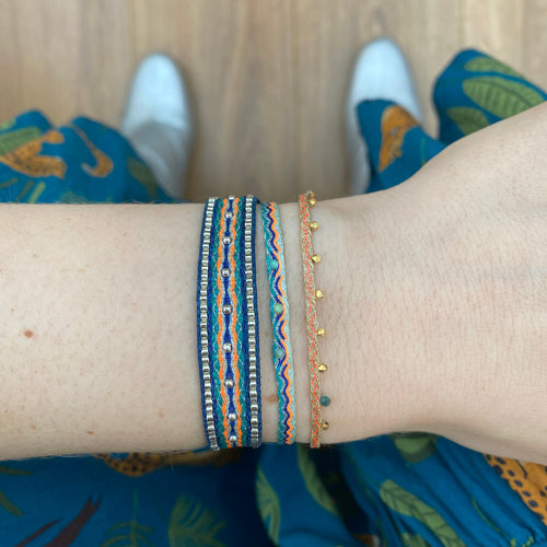 HANDWOVEN BRACELET WITH THREE TURQUOISE STONES
