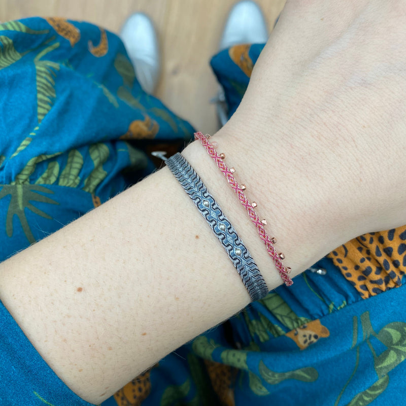HANDWOVEN BRACELET IN GREY TONES WITH 3 SILVER BEADS