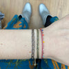 HANDWOVEN THREE STONE BRACELET IN BLACK AND GOLD TONES