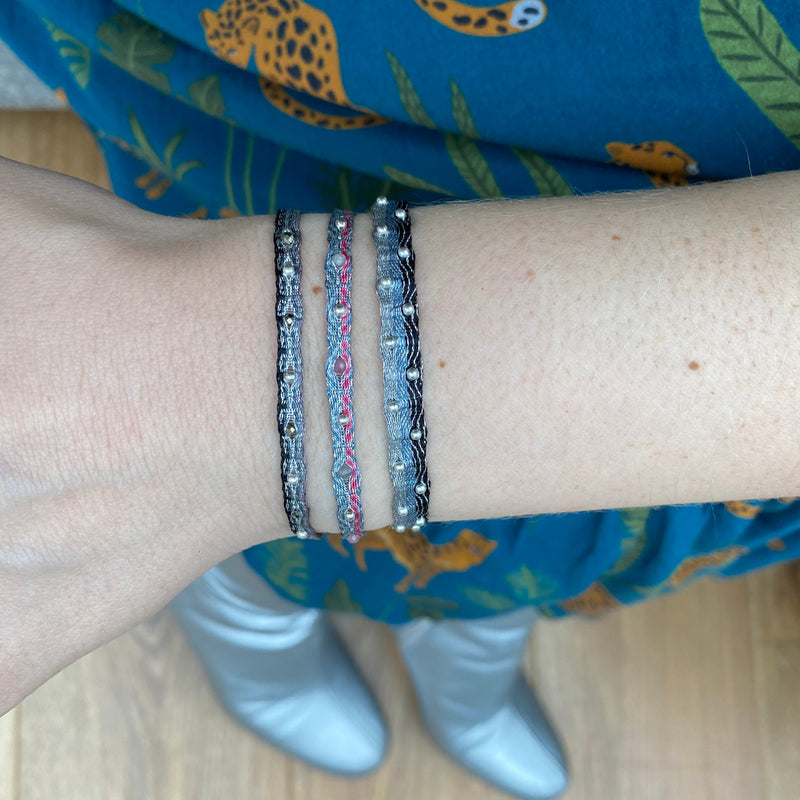 HANDWOVEN BRACELET IN SILVER AND PINK TONES