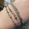 CHIC BRACELET IN BROWN TONES FEATURING GOLD AND GEMSTONES DETAIL