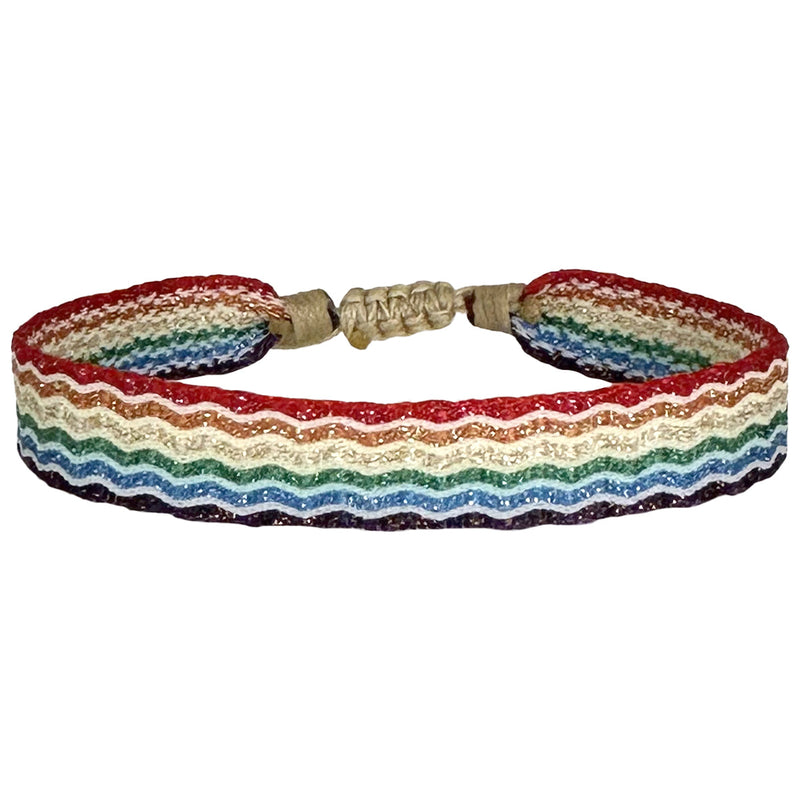 You are powerful, strong and creative. You are capable of great things. You have the ability to create anything you want in your life. This magnificent design is handwoven using 160 threads, it takes for our master artisans 1 hour and 20 minutes to weave each bracelet. Details:  - Handwoven using Polyester  - Can be worn in the water - Width 8 mm  -Adjustable bracelet  -Women bracelet -Pride bracelet