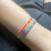 HANDMADE RAINBOW BRACELET FEATURING COLORFUL HEARTS DETAIL