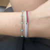 HANDWOVEN BRACELET IN BRIGHT TONES WITHONE GOLD BEAD