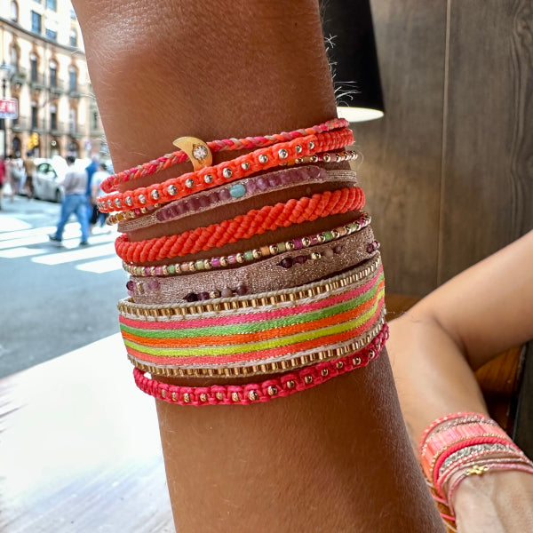 This LeJu bracelet has been handwoven in Colombia by our team of artisans using polyester threads featuring amazonite and pink tourmaline stones.  A delicate bracelet in an elegant design. This handmade beauty is the perfect gift for someone special.  Details:  - Amazonite and pink toumaline semi-precious stones  - Handwoven using polyester threads  - Width 3mm  -Women bracelet  - Adjustable bracelet  -Can be worn in the  water