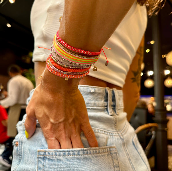 This LeJu bracelet has been handwoven in Colombia by our team of artisans using polyester threads featuring amazonite and pink tourmaline stones.  A delicate bracelet in an elegant design. This handmade beauty is the perfect gift for someone special.  Details:  - Amazonite and pink toumaline semi-precious stones  - Handwoven using polyester threads  - Width 3mm  -Women bracelet  - Adjustable bracelet  -Can be worn in the  water