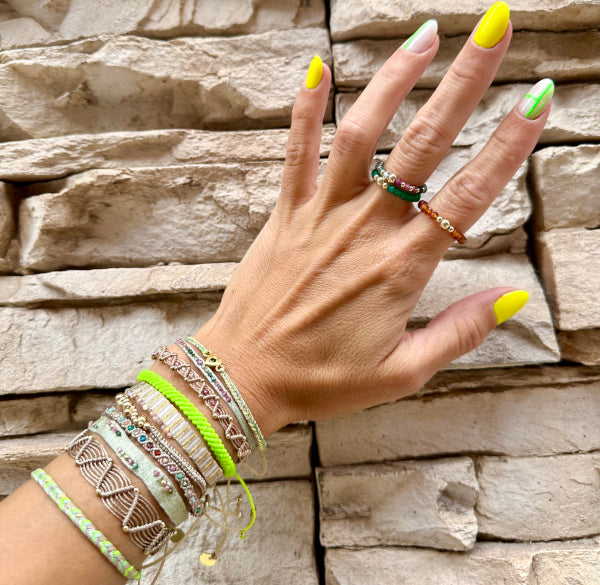 This LeJu bracelet has been handwoven in Colombia by our team of artisans using polyester threads featuring watermelon tourmaline semi-precious stones that gives you positive loving vibrations.  Details:  - Watermelon tourmaline semi-precious stones  - Handwoven using polyester threads  - Width 3mm  -Women bracelet  - Adjustable bracelet  -Can be worn in the  water