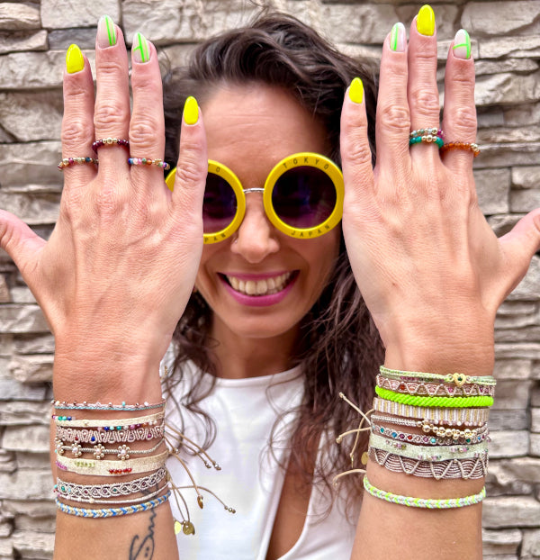 This LeJu bracelet has been handwoven in Colombia by our team of artisans using polyester threads featuring watermelon tourmaline semi-precious stones that gives you positive loving vibrations.  Details:  - Watermelon tourmaline semi-precious stones  - Handwoven using polyester threads  - Width 3mm  -Women bracelet  - Adjustable bracelet  -Can be worn in the  water