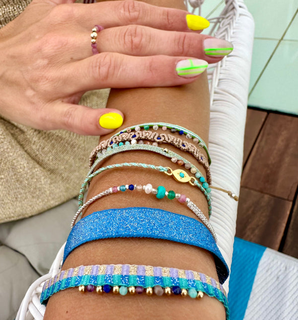 This magnificent design is handwoven using 160 threads, it takes for our master artisans 1 hour and 20 minutes to weave each bracelet. Details:  - Handwoven using Polyester  - Can be worn in the water - Width 8 mm  -Adjustable bracelet  -Women bracelet