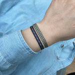 BASIC HANDWOVEN BRACELET IN TONES OF BLUE, BEIGE & GOLD