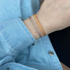 BASIC HANDWOVEN BRACELET IN TONES OF YELLOW, PINK & BEIGE