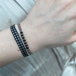 BASIC HANDWOVEN BRACELET IN BLACK, BEIGE & GOLD