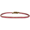 Handwoven in Colombia, this feminine bracelet features a single row of Japanese glass beads.  Wear this stylish bracelet alone or as a part of a bracelet layering combination, with your favourite jeans & t-shirt!  Details:  - Japanese glass beads  - Width: 2mm  - Adjustable bracelet   -Can be worn in the water