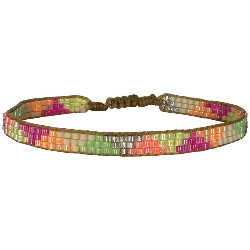   This cool bracelet is handwoven by our team of artisans in Colombia using Japanese glass beads.   Wear it with your favourite accessories !  Details:      Japanese glass beads     Handwoven adjustable bracelet     Width 5mm     Can be worn in the water