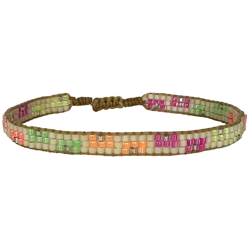   This cool bracelet is handwoven by our team of artisans in Colombia using Japanese glass beads.   Wear it with your favourite accessories !  Details:      Japanese glass beads     Handwoven adjustable bracelet     Width 5mm     Can be worn in the water