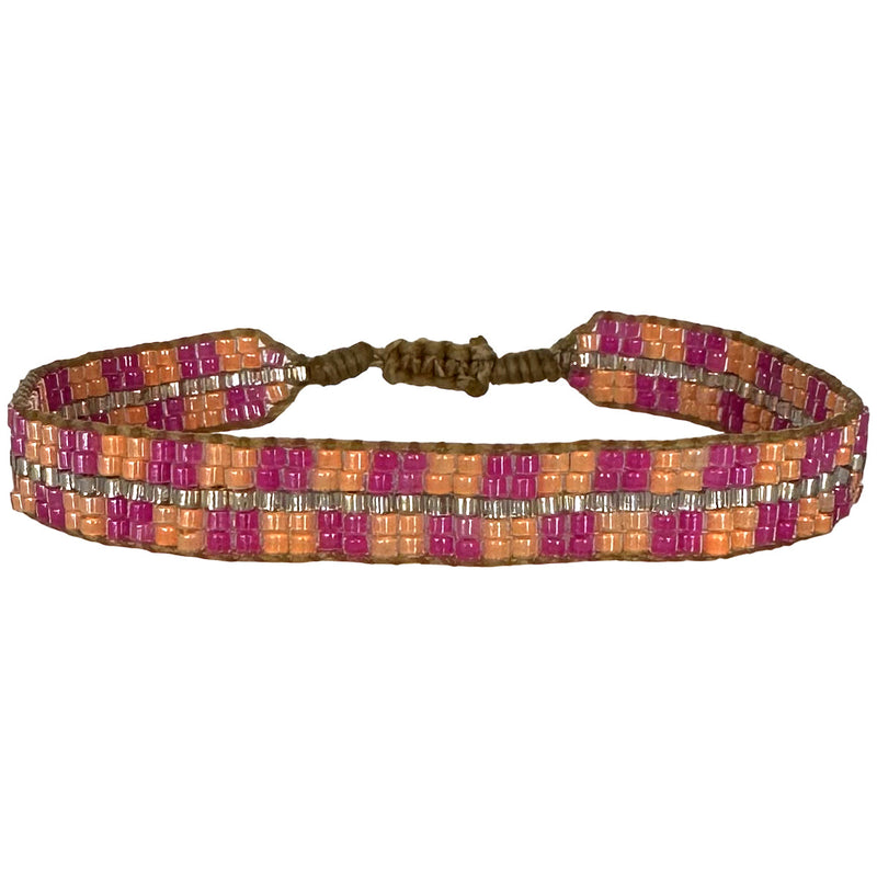   This cool bracelet is handwoven by our team of artisans in Colombia using Japanese glass beads.   Wear it with your favourite accessories !  Details:      Japanese glass beads     Handwoven adjustable bracelet     Width 9mm     Can be worn in the water
