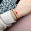 HANDWOVEN TRENZA BRACELET IN RED & GOLD