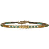 Handwoven in Colombia, this feminine bracelet features a single row of Japanese glass beads and gold faceted beads  Wear this stylish bracelet alone or as a part of a bracelet layering combination, with your favourite jeans & t-shirt!  Details:  -Gold faceted beads  - Japanese glass beads  - Width: 2mm  - Adjustable bracelet 