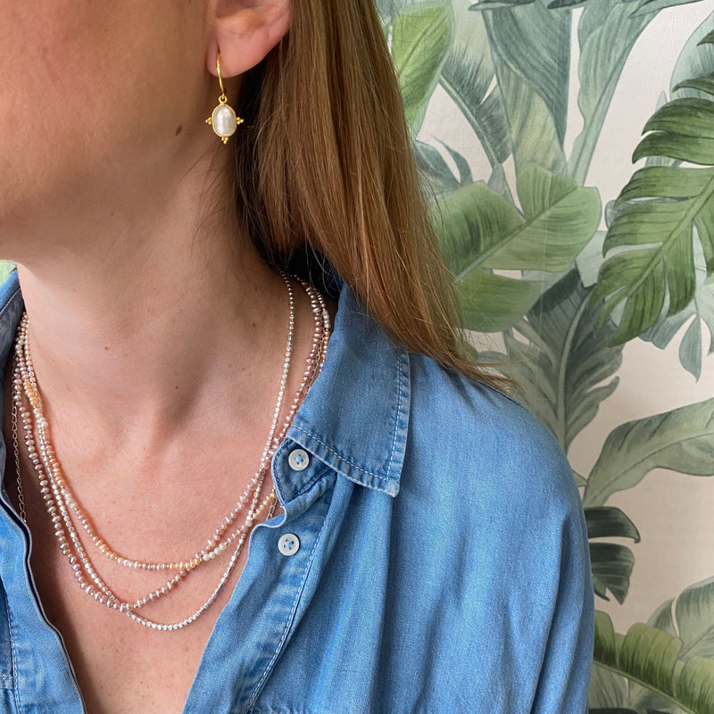 HANDMADE LILAC PEARL NECKLACE ON MODEL