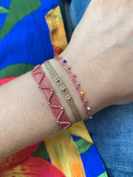 SET OF TWO HANDWOVEN BRACELETS IN PINK TONES