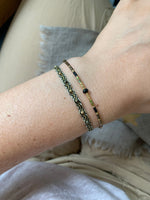 INTERMIXED HANDWOVEN BRACELET IN GOLD TONES