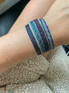 SET OF FOUR BASIC BRACELETS IN DARK BLUE AND PURPLE TONES