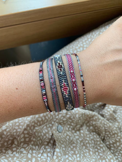 SET OF THREE PINK AND GREY BRACELETS WITH SILVER DETAILS