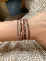 HANDWOVEN INTERMIXED BRACELET IN PINK TONES