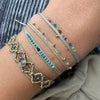 HANDMADE FRIDA BRACELET IN GOLD TONES FEATURING TURQUOISE AND LAPIS LAZULI STONE