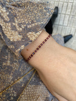 SCARLETT HANDMADE BRACELET FEATURING ALMANDITE STONES AND GOLD BEADS