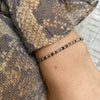 SCARLETT HANDMADE BRACELET FEATURING GOLD OBSIDIAN STONES AND SILVER BEADS