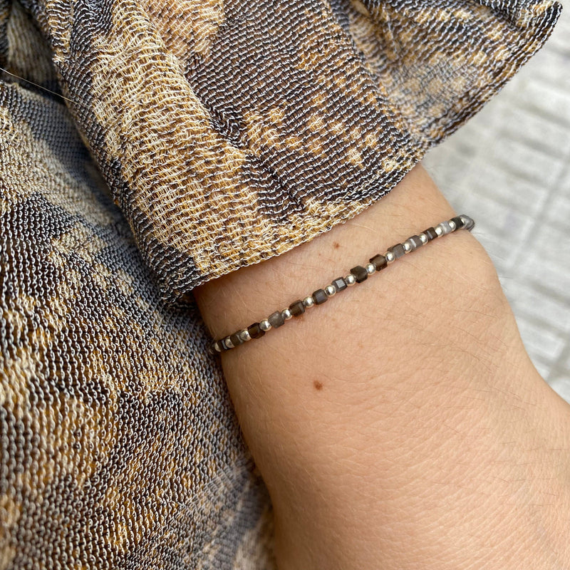 SCARLETT HANDMADE BRACELET FEATURING GOLD OBSIDIAN STONES AND SILVER BEADS