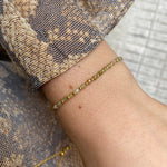 SCARLETT HANDMADE BRACELET FEATURING TSAVORITE STONES AND GOLD BEADS