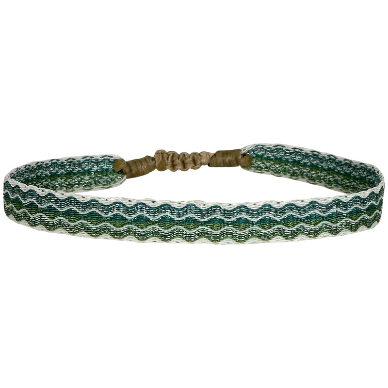 Designed and handwoven to be worn at all times using traditional artisanal handcrafting and techniques that take plenty of time and love This bracelet is handmade using neon polyester threads that glow in the dark!!  Details:  - Handwoven using Polyester  -Can be worn in the water  - Stainless steel "LeJu London" logo/tag  - Width 5mm