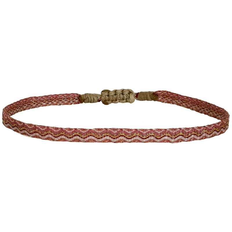 Designed and handwoven to be worn at all times using traditional artisanal handcrafting and techniques that take plenty of time and love This bracelet is handmade using neon polyester threads that glow in the dark!!  Details:  - Handwoven using Polyester  -Can be worn in the water  - Stainless steel "LeJu London" logo/tag  - Width 5mm
