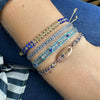 Designed and handwoven to be worn at all times using traditional artisanal handcrafting and techniques that take plenty of time and love  Details:  - Handwoven using Polyester  -Can be worn in the water  - Stainless steel "LeJu London" logo/tag  - Width 3mm