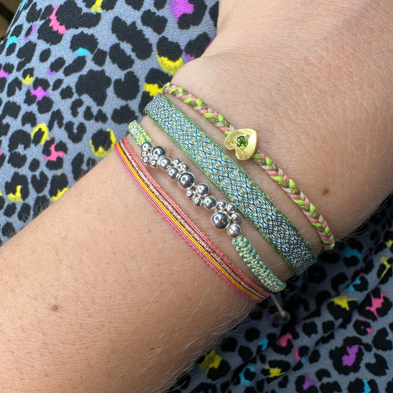 BASIC HANDWOVEN BRACELET IN ORANGE, PINK AND BEIGE TONES