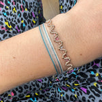 BASIC HANDWOVEN  BRACELET IN GOLD, TURQUOISE AND PINK TONES