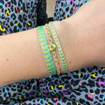 BASIC HANDWOVEN NEON  BRACELET IN GREEN AND SILVER TONES
