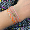 Designed and handwoven to be worn at all times using traditional artisanal handcrafting and techniques that take plenty of time and love This bracelet is handmade using neon polyester threads that glow in the dark!!  Details:  - Handwoven using Polyester  -Can be worn in the water  - Stainless steel "LeJu London" logo/tag  - Width 5mm