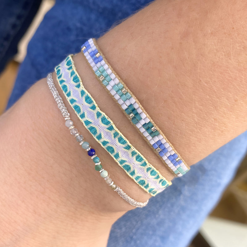 BASIC HANDWOVEN BRACELET IN TONES OF GREEN, PALE BLUE AND YELLOW