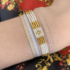 BASIC HANDWOVEN SPARKLE BRACELET IN SILVER, GOLD AND ORANGE