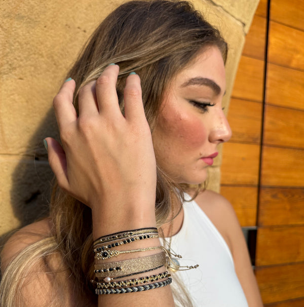 GOLDEN HANDWOVEN BRACELET FEATURING SPINEL STONES AND GOLD DETAILS