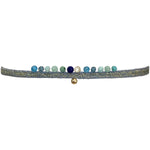 This LeJu bracelet has been handwoven in Colombia by our team of artisans using metallic threads featuring a 14K gold filled bead and intermixed semi-precious stones. Balancing the body, mind and spirit.  Details:  - Intermixed semi-precious stones  - 14 k gold filled beads  - Handwoven using metallic threads  - Width 2mm  -Women bracelet  - Adjustable bracelet  -Can be worn in the  water